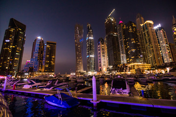 Fototapeta premium Dubai, UAE - October, 2018. Skycrapers at Dubai Marina. Dubai marina at night night cityscape lights