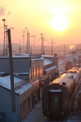 Freight trains on winter and sunset on station
