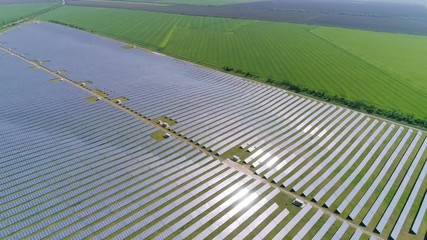 Aerial shot of triangular solar thermal station in Odessa region in summer