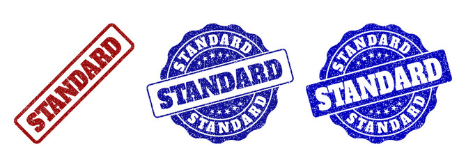 STANDARD grunge stamp seals in red and blue colors. Vector STANDARD marks with grunge surface. Graphic elements are rounded rectangles, rosettes, circles and text captions.