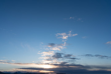 Beautiful clouds with blue sky background with part of clear sky background. Nature weather, cloud blue sky and sun / sunrise and sunset concept / sky texture / mapping