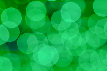 Green light blurred and bokeh. Christmas, New year and Wallpaper and background concept.