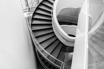 spiral staircase down in a modern office building