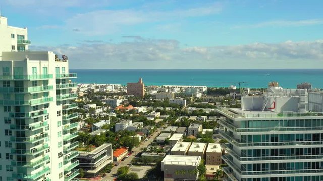 Aerial Miami Beach FL scene between highrise buildings