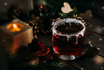 Obraz premium Hot mulled wine and romantic winter scenery. Valentine's Day