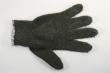 Close up top view old glove isolated on white background