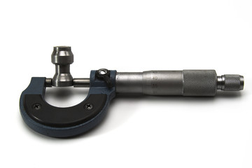 12 gauge diameter micrometer measurement for a hunting rifle close-up on a white background