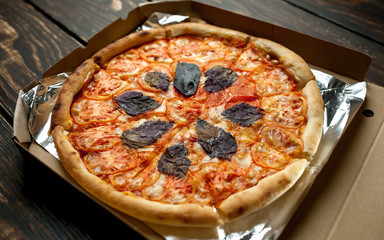 pizza on a wooden table