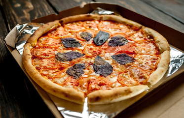 pizza on a wooden table