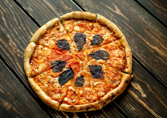 pizza on a wooden table