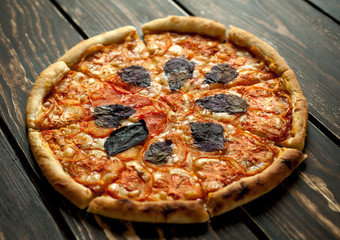 pizza on a wooden table