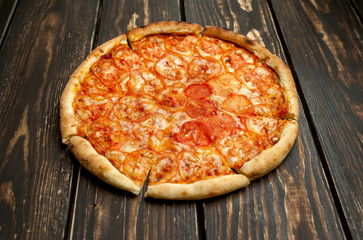 pizza on a wooden table