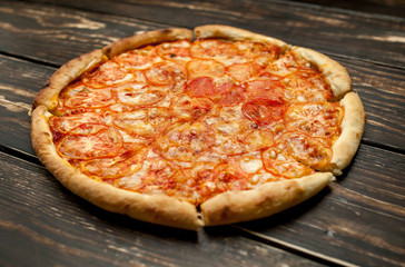 pizza on a wooden table