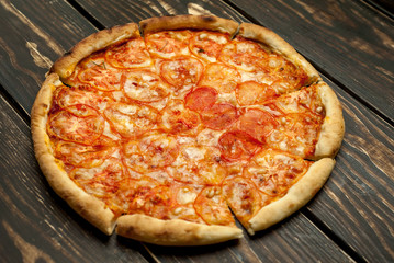 pizza on a wooden table