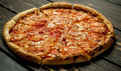 pizza on a wooden table