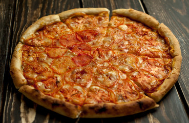 pizza on a wooden table