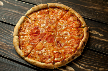 pizza on a wooden table