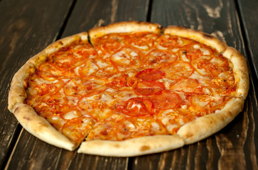 pizza on a wooden table