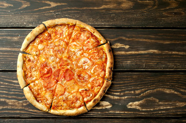pizza on a wooden table