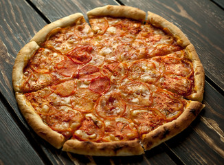pizza on a wooden table