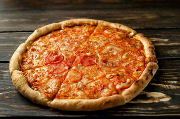 pizza on a wooden table