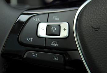 cruise control stick which is located on the the steering wheel