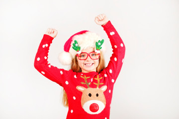 Excited Christmas Girl Jumping in Celebration, Isolated on Teal