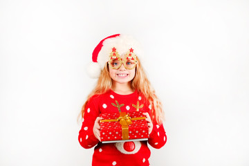 Excited Christmas Girl Jumping in Celebration, Isolated on Teal