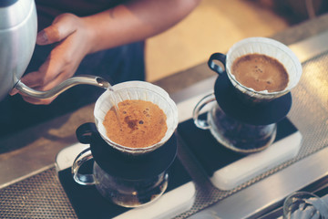 drip coffee in cafe, vintage filter image