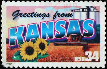 Greetings from Kansas postcard on stamp