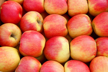 fresh red apples on the market
