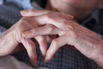 Fototapeta na wymiar Hands at rest after 98 years of labor