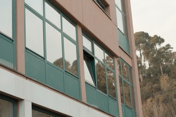 Isolated open window of a pink colored building (Pesaro, Italy, Europe)