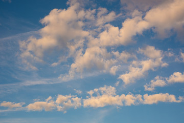 blue sky with yellow clouds