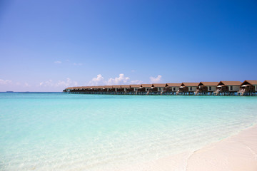 White sand beach and crystal clear water in the Maldives