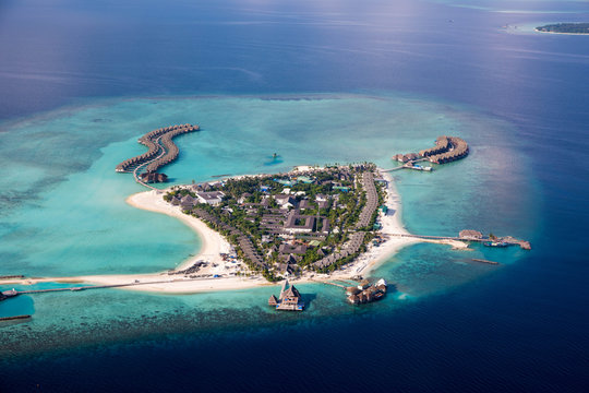 Aerial Of The Beautiful Maldives, Looking Down At Some Stunning Islands And Atolls