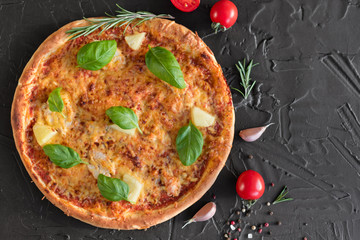 Pizza, food, vegetable, margarita.  Vegetables, mushrooms and tomatoes pizza on a black wooden background. It can be used as a background