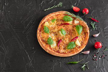 Pizza, food, vegetable, margarita.  Vegetables, mushrooms and tomatoes pizza on a black wooden background. It can be used as a background