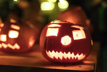 Illuminated figures made of pumpkins. Helloween night.
