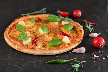 Pizza, food, vegetable, margarita.  Vegetables, mushrooms and tomatoes pizza on a black wooden background. It can be used as a background