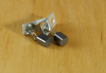 Carbon brush for electrical micromotor. Macro image.