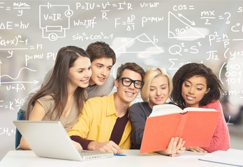 Young students studying on library background