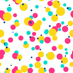 Messy colorful dots on white background. Magenta, blue, yellow festive seamless pattern with round shapes. Grunge dotted texture for wrapping paper, web. Vector illustration.