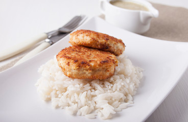 Fish Cutlets with rice garnish