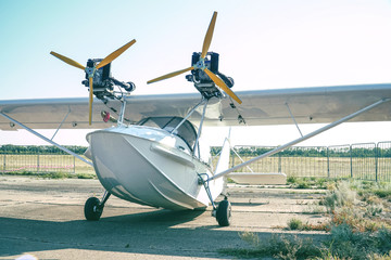 Light twin-engine amphibious aircraft at the airport