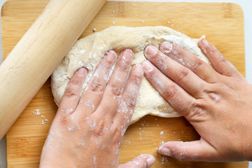Fototapeta premium Woman hands kneading