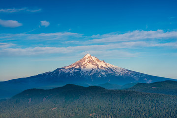 the last sunlight of the day hits the top of Mt. Hood
