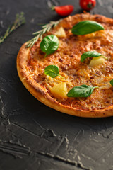 pizza, pineapple, chicken, tomato sauce, cheese, basil (pizza ingredients). Hawaiian pizza. Top view. copy space