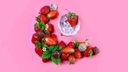 Top of view fresh strawberry and chocolate Isolated on pink background. Healthy food. free space for text