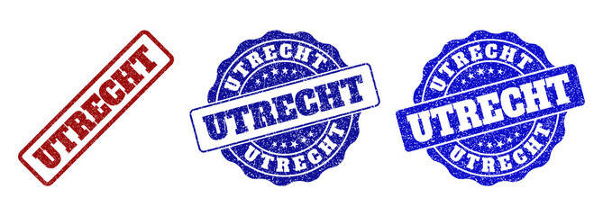 UTRECHT grunge stamp seals in red and blue colors. Vector UTRECHT labels with grunge effect. Graphic elements are rounded rectangles, rosettes, circles and text titles.
